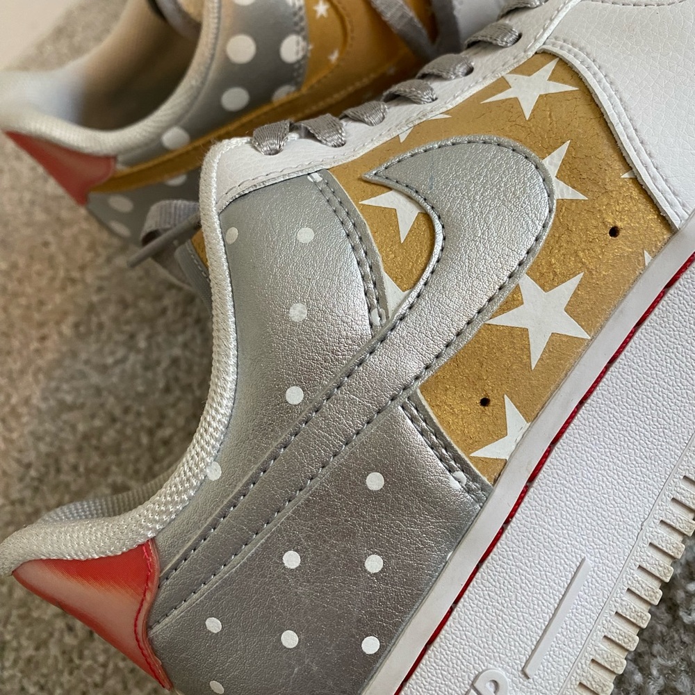 Nike Silver and Gold Star Sneakers